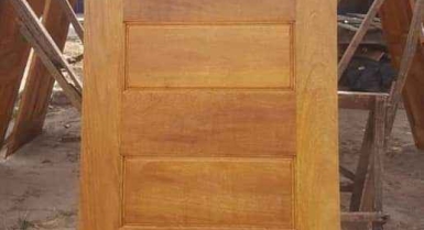 Porte en iroko et kotibé en vente