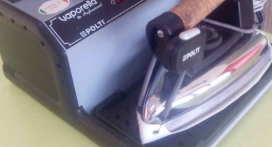 Fer de pressing avec protection anti-brulure